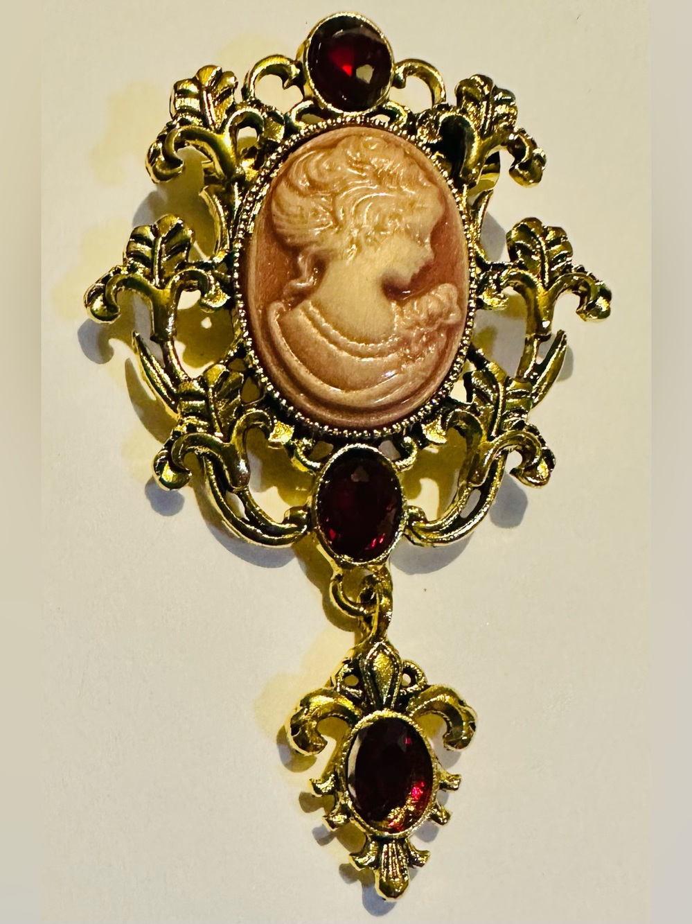 Vintage-Inspired Gold Tone Cameo Like Pendant Brooch with Red Accents